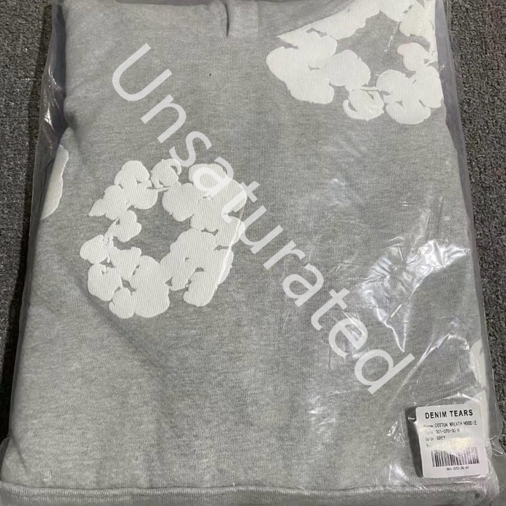 Denim Tears Gray Hoodie with White Floral Design